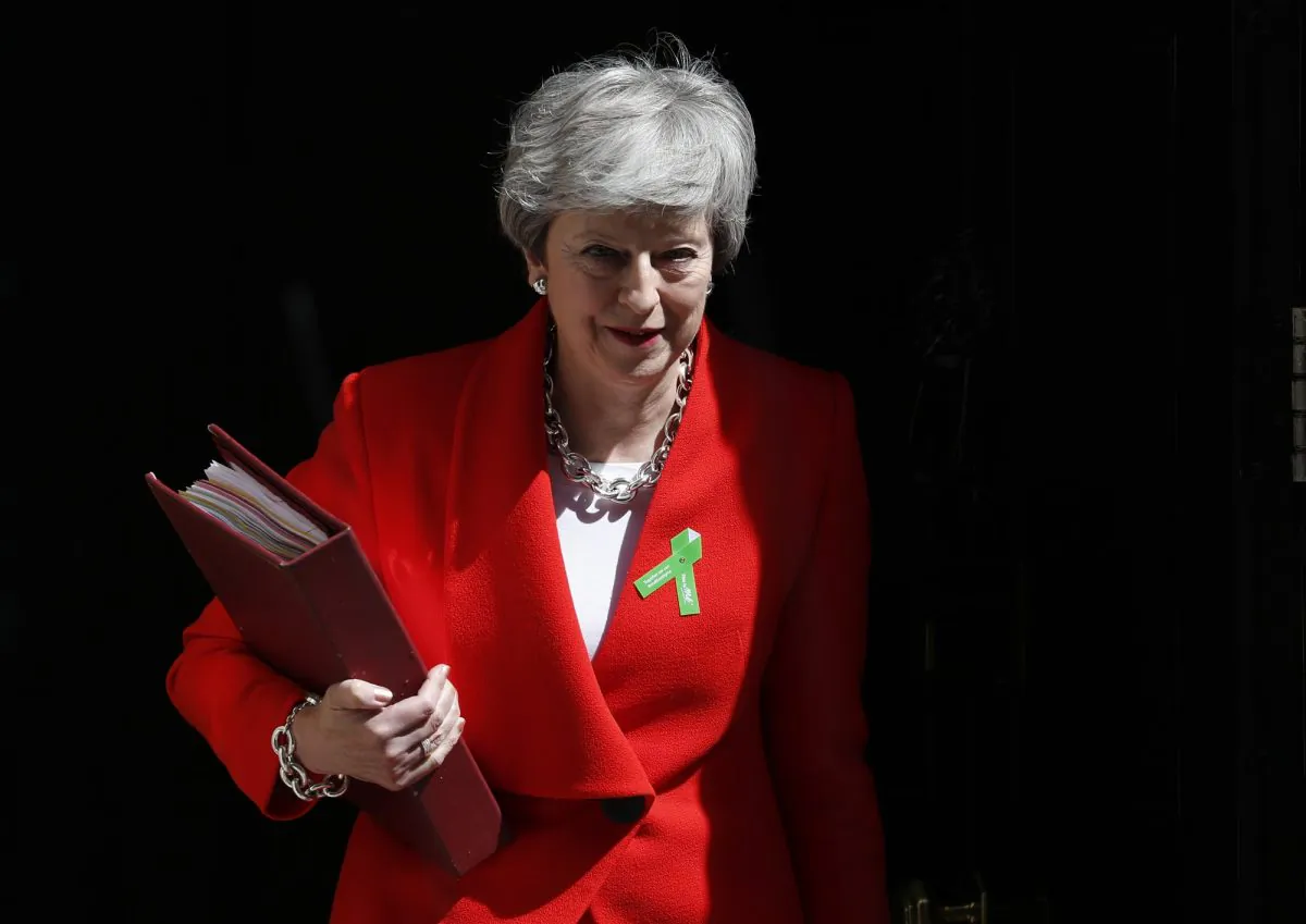 Britain's Prime Minister Theresa May leaves 10 Downing Street for her weekly Prime Minister's Questions in the House of Commons in London on May 15, 2019. (Alastair Grant/Photo via AP)