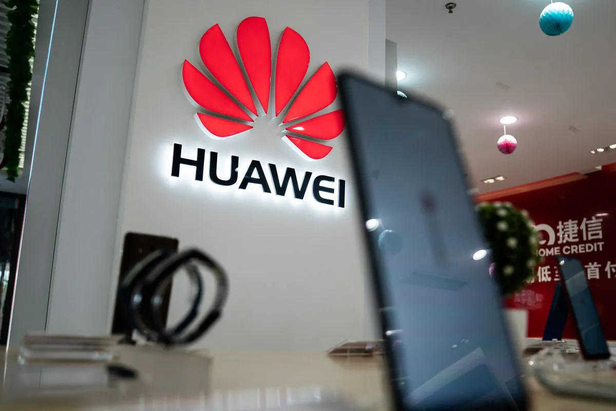A Huawei logo is displayed at a retail store in Beijing on May 20, 2019. (Fred Dufour/AFP/Getty Images)