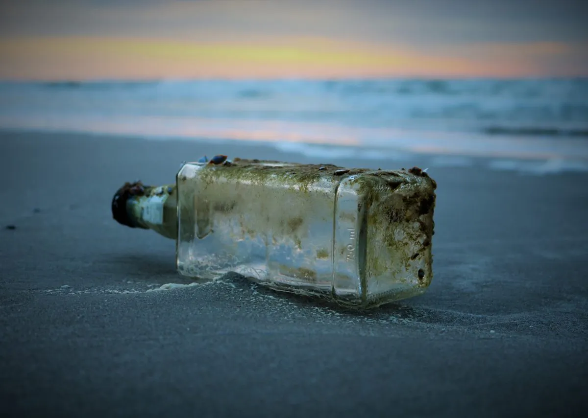 This composed file image shows a bottle with a message. (Pixabay)