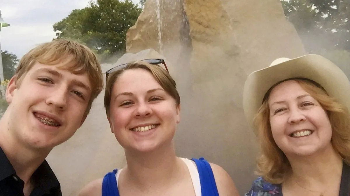 Photo made available by Virginia Black, right, shows her niece, Alexandra Black, and her son, Anthony Hauguel, in Lafayette, Indiana. (Alexandra Black via AP)