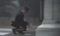 Severe Thunderstorm Didn’t Deter This Soldier From Placing Flag at Tomb of the Unknown