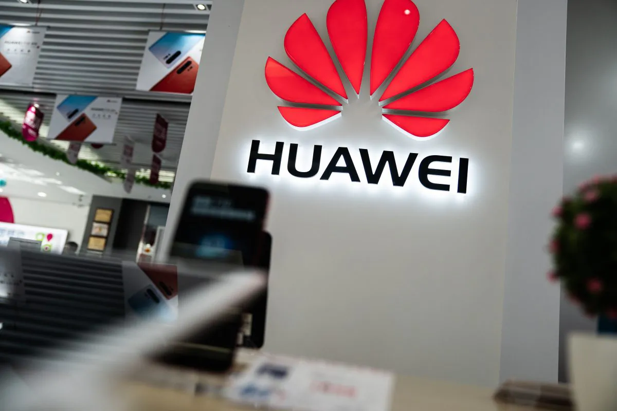 A Huawei logo is displayed at a retail store in Beijing on May 20, 2019. (FRED DUFOUR/AFP/Getty Images)