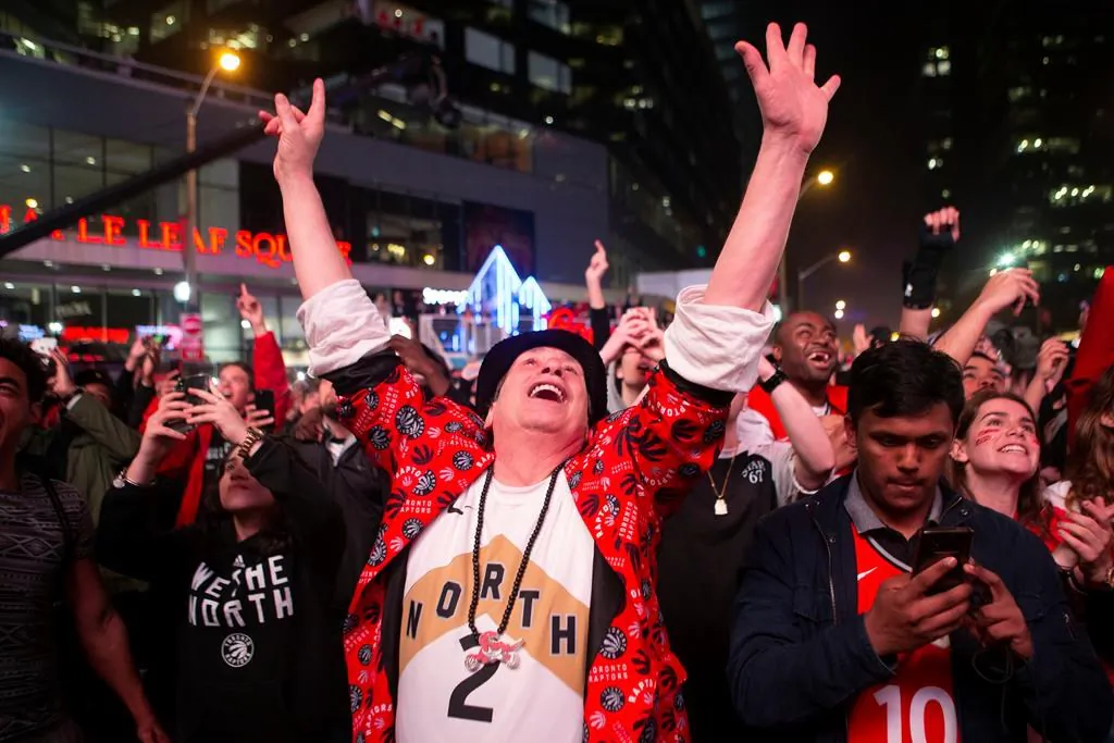 Toronto Raptors fans celebrate in the closing seconds of the team's 100-94 win over the Milwaukee Bucks to take the NBA Eastern Conference Championship, in Toronto on Saturday, May 25, 2019. The Raptors go to the NBA final for the first time in the franchise's history. (Chris Young/The Canadian Press)