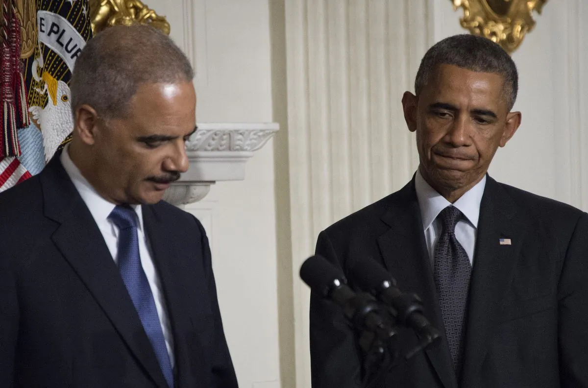 President Barack Obama (R) and Attorney General Eric Holder at the White House on Sept. 25, 2014. (Jim Watson/AFP/Getty Images)