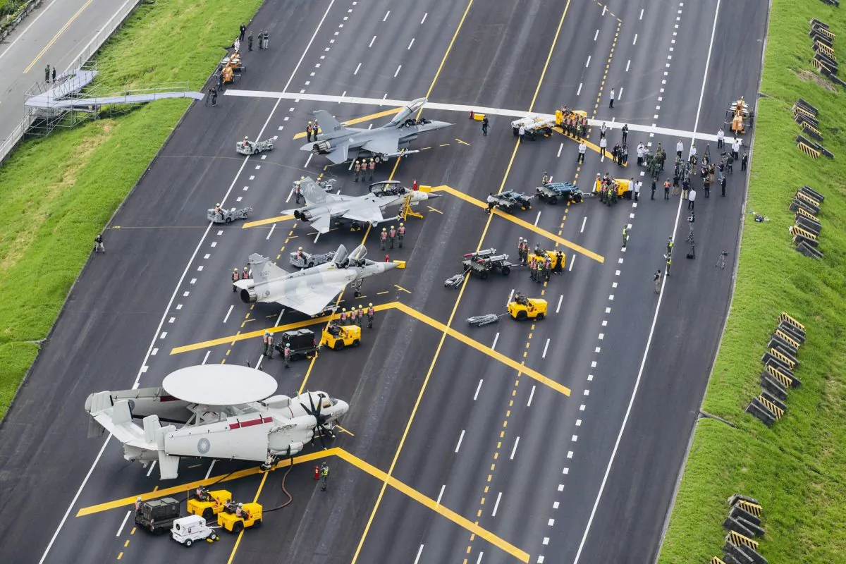 Taiwan war planes are parked on a highway during an exercise to simulate a response to a Chinese attack on its airfields in Changhua, Taiwan, on May 28, 2019. (Military News Agency via AP)