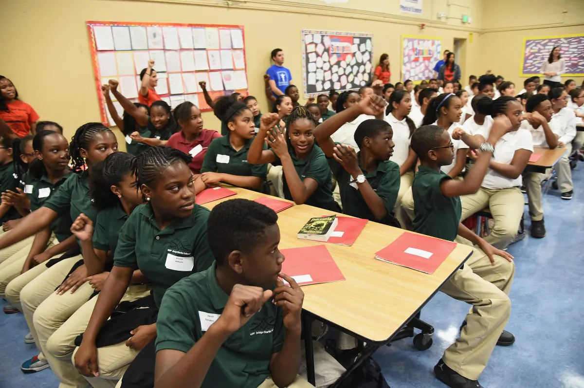 Bay Area students are surprised with new instruments at KIPP Bridge Charter School in San Francisco on Aug. 12, 2014. (Michael Buckner/Getty Images for StubHub)