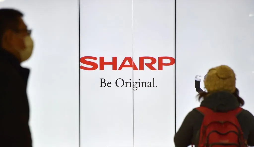 The logo of Sharp is displayed at a railway station in Tokyo on Feb. 17, 2017. (Kazuhiro Nogi/AFP/Getty Images)