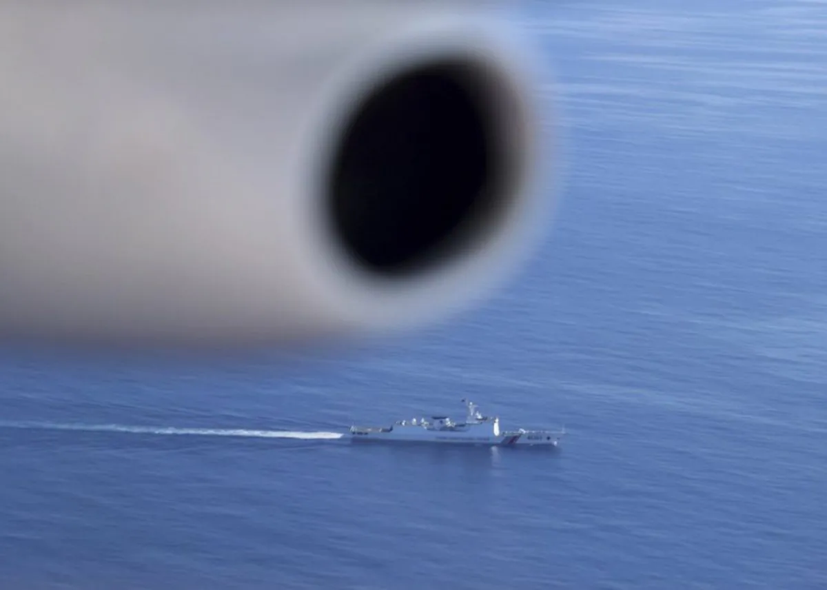 A Chinese Coast Guard ship is seen while American and Philippine coast guards conduct joint search and rescue and capability-building exercises off South China Sea west of the Philippines on May 14, 2019. (Philippine Coast Guard Via AP)