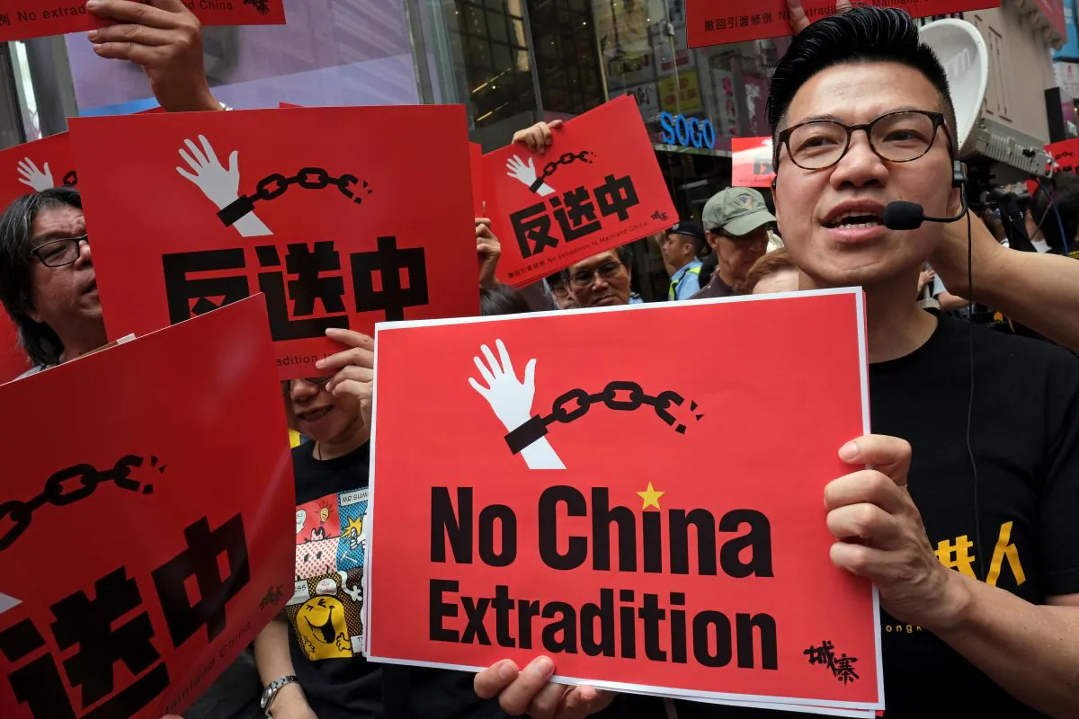 Demonstrators march during a protest to demand authorities to scrap a proposed extradition bill with China, in Hong Kong, China on April 28, 2019. (Tyrone Siu/Reuters)