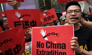 Hong Kong Lawyers Protest 'Polarizing' Extradition Bill in Rare March