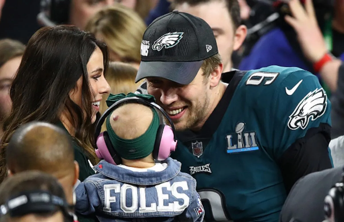Nick Foles #9 of the Philadelphia Eagles celebrates defeating the New England Patriots 41-33 with his wife Tori Moore in Super Bowl LII at U.S. Bank Stadium in Minneapolis, Minn., on Feb. 4, 2018. (Gregory Shamus/Getty Images)