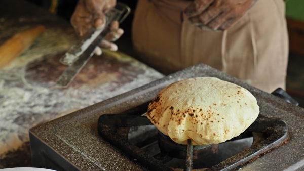 fulka roti or chapati puffed up over a flame