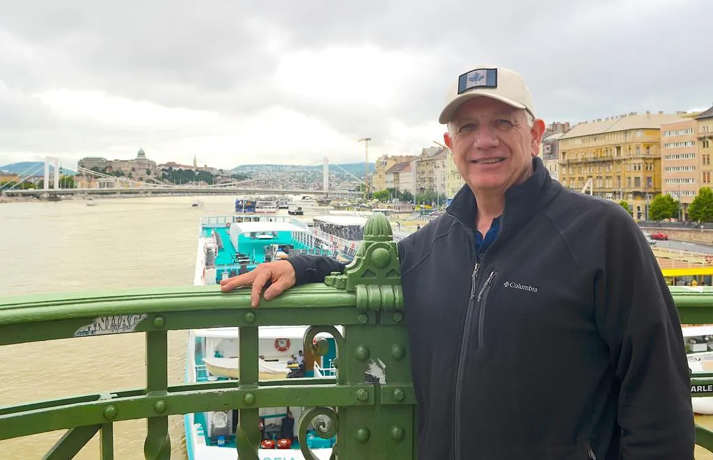 Ken Hoffer, of Halifax, poses on the Liberty Bridge above the Danube River in Budapest, Hungary, on May 30, 2019. A Canadian tourist who was on the Danube River in Budapest when two boats collided on May 29 says the experience was "surreal and "sobering". Ken Hoffer, of Halifax, says he was on a cruise boat about two bridges down from where the crash occurred, when he saw a man in a life ring float by in the chilly and fast moving water. (HO - Ken Hoffer/The Canadian Press)