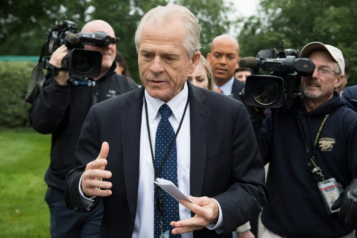 White House Director of Trade Policy Peter Navarro (C) dodges the press after speaking on Fox News at the White House in Washington on June 4, 2018. (JIM WATSON/AFP/Getty Images)
