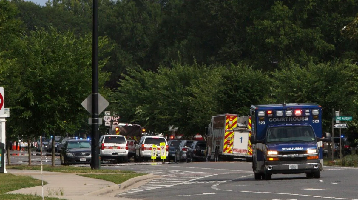 Emergency vehicles are seen near the intersection of Princess Anne Road and Nimmo Parkway following a shooting at the Virginia Beach Municipal Center in Virginia Beach, Va., on on May 31, 2019. (Kaitlin McKeown/The Virginian-Pilot via AP)