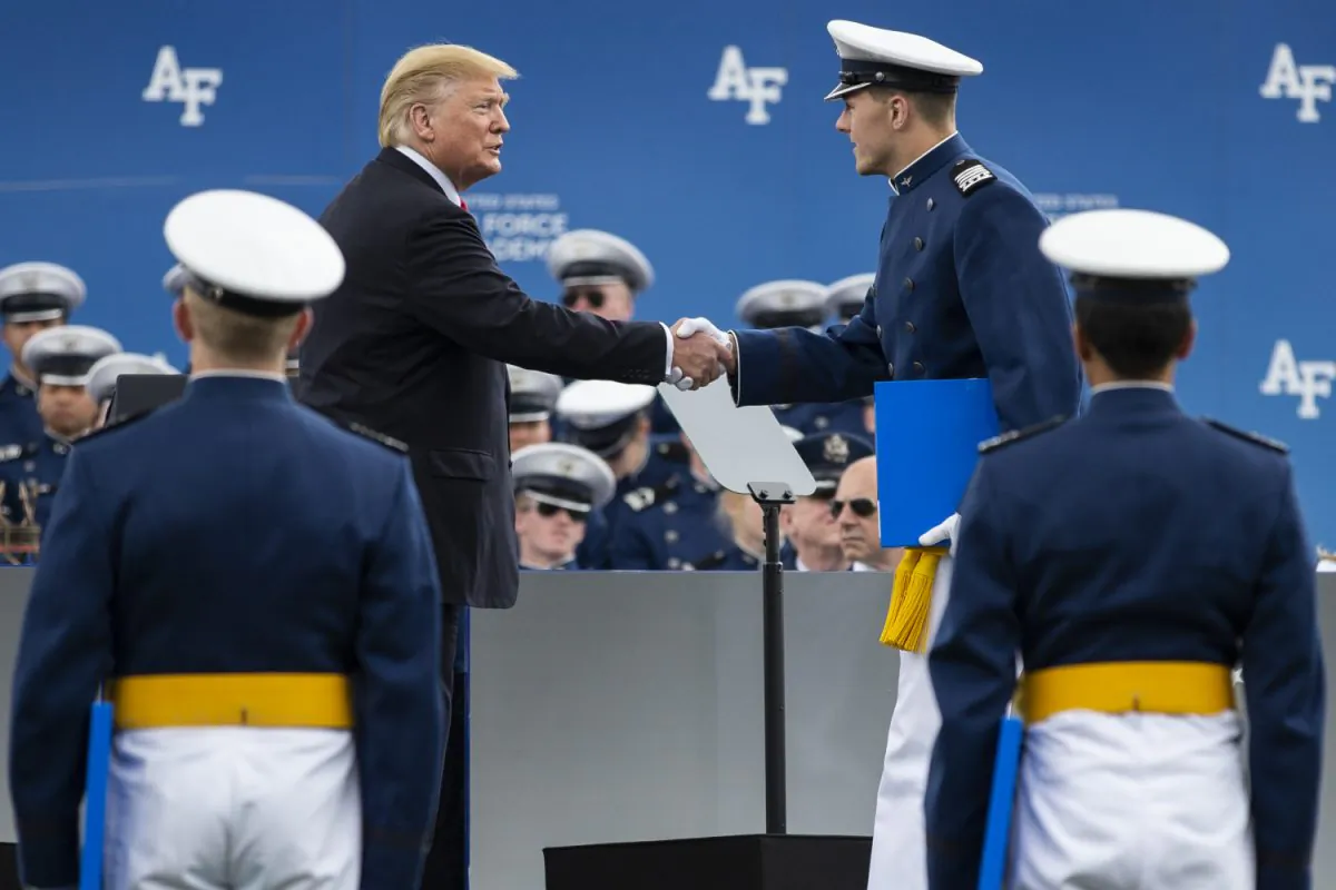 President Donald Trump congratulates graduates as they receive diplomas during the 2019 graduation ceremony at the United States Air Force Academy in Colorado Springs, Colorado on May 30, 2019. (Chet Strange/AFP/Getty Images)
