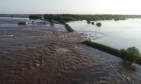 Record Floods Breach Arkansas Levee, Overtop 2 in Missouri