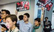 Former Hong Kong Lawmaker Ted Hui Goes Into Exile