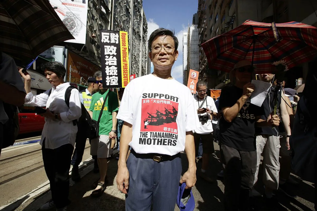 Pro-democracy activists march to mark the 25th anniversary of Tiananmen Square massacre, in Hong Kong on June 1, 2014. The protest wound its way from Victoria Park, Causeway Bay, to finish at the Government Offices in Admiralty. (Photo by Jessica Hromas/Getty Images)