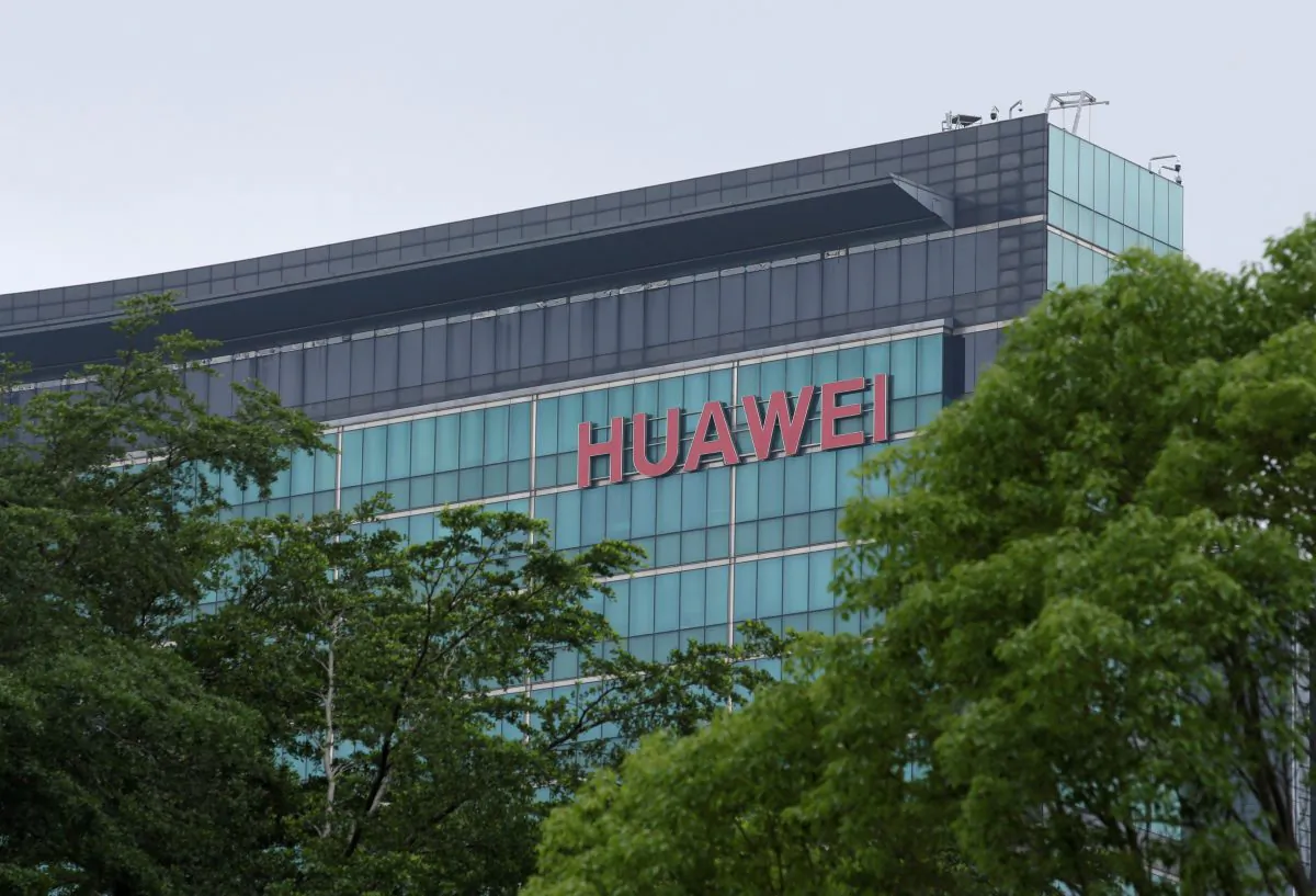 A Huawei logo is seen on the side of a building at the headquarters in Shenzhen, Guangdong Province, China, on May 30, 2019. (Jason Lee/Reuters)