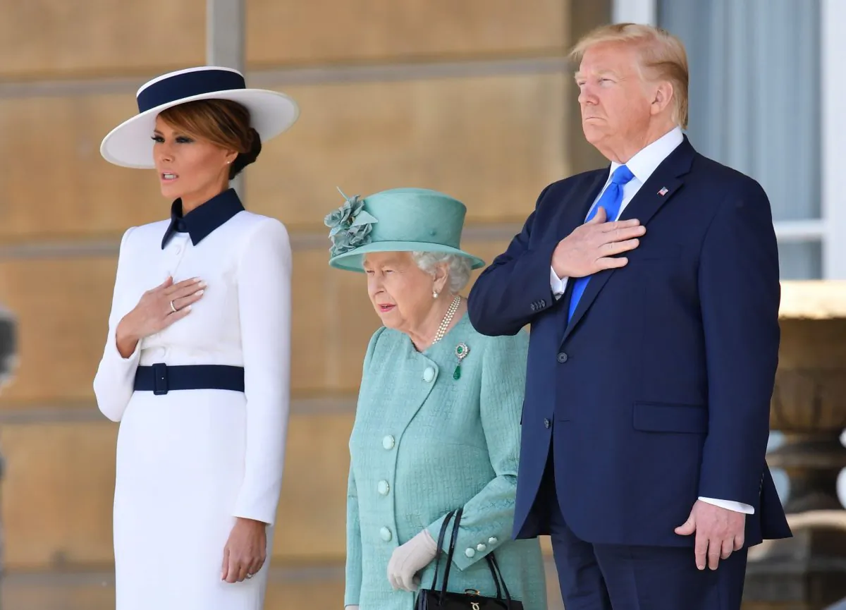 Queen Elizabeth II stands with President Donald Trump and first lady Melania Trump during a welcome ceremony at Buckingham Palace in London on June 3, 2019. (Toby Melville - WPA Pool/Getty Images)