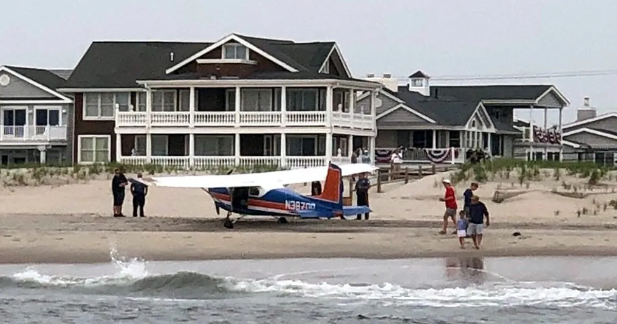 A small single-engine Cessna plane survives an emergency landing in Ocean City, N.J., on June 1, 2019. (Ocean City Police Department via AP)