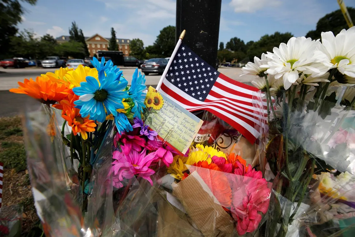 A card lists the names of the victims at a makeshift memorial outside a municipal government building where a shooting incident occurred in Virginia Beach, Vir., U.S. on June 1, 2019. (Jonathan Drake/Reuters)