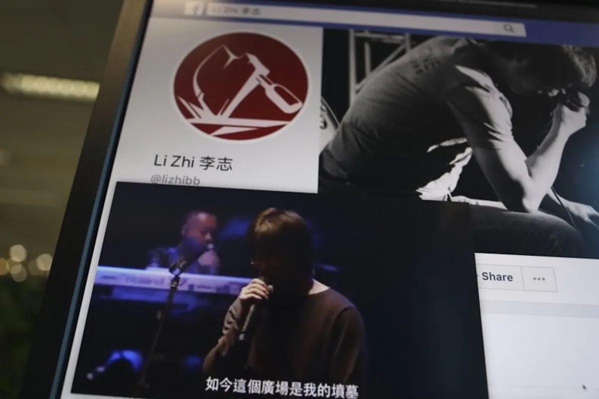 In this May 30, 2019, photo, a computer screen shows web content from outside China including a clip of Chinese singer Li Zhi singing his song "The Square" with the lyrics "Now this square is my grave" and his social media site in Beijing. Li is an outspoken artist who performs "folk-rock." He sang pensive ballads about social ills, and unlike most entertainers in China, he dared to broach the taboo subject of the Tiananmen Square pro-democracy protests that ended in bloodshed on June 4, 1989. (Ng Han Guan/AP)