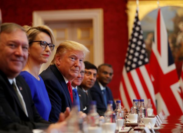 President Donald Trump attends a business roundtable discussion
