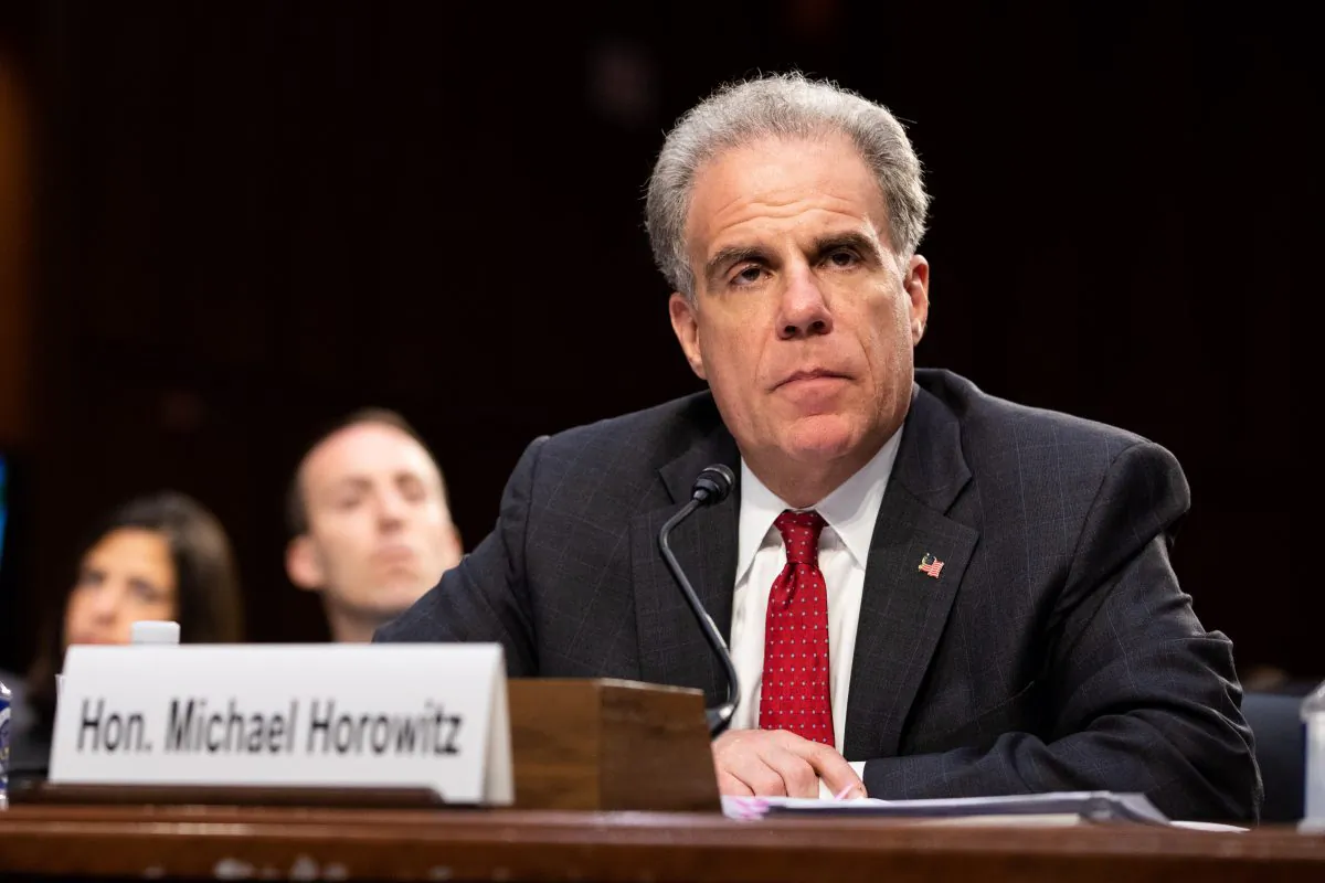 Michael Horowitz, inspector general at the U.S. Department of Justice and FBI Director Christopher Wray at a Senate hearing in Washington on June 18, 2018. (Samira Bouaou/The Epoch Times)