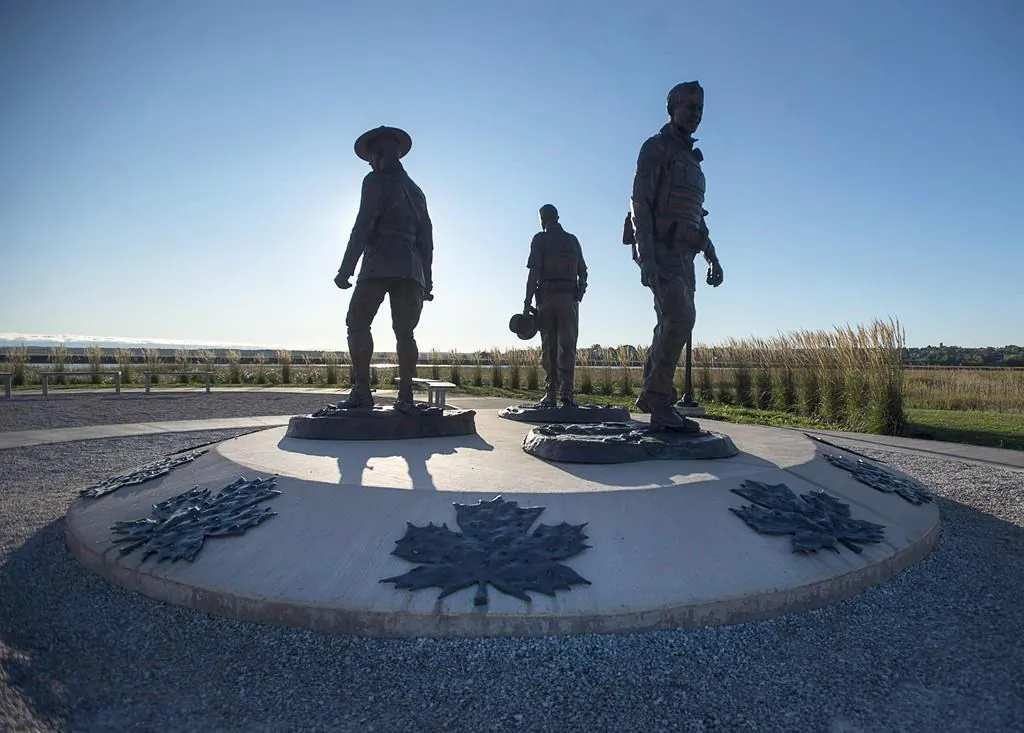 The monument honouring RCMP Constables Fabrice Gevaudan, Dave Ross and Doug Larche, gunned down in 2014, is seen in Moncton, N.B. on September 29, 2017. (Andrew Vaughan/The Canadian Press)