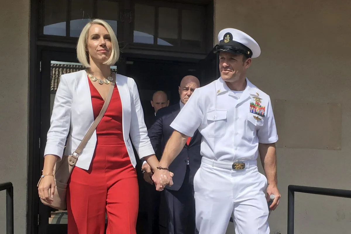 Navy Special Operations Chief Edward Gallagher leaves a military courtroom on Naval Base San Diego with his wife, Andrea Gallagher in San Diego on May 31, 2019. (Julie Watson/AP)