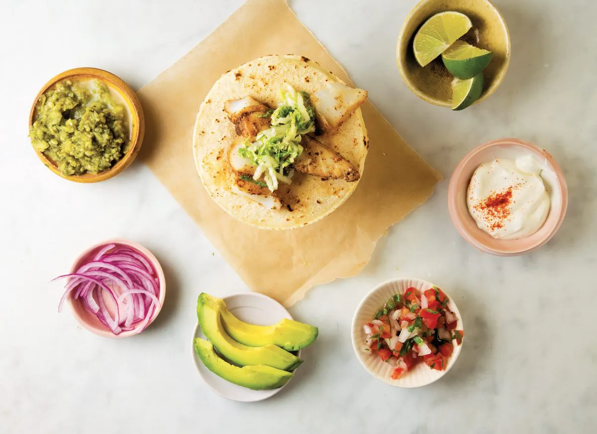 Set out toppings and let the kids build their own tacos. (Todd Coleman)