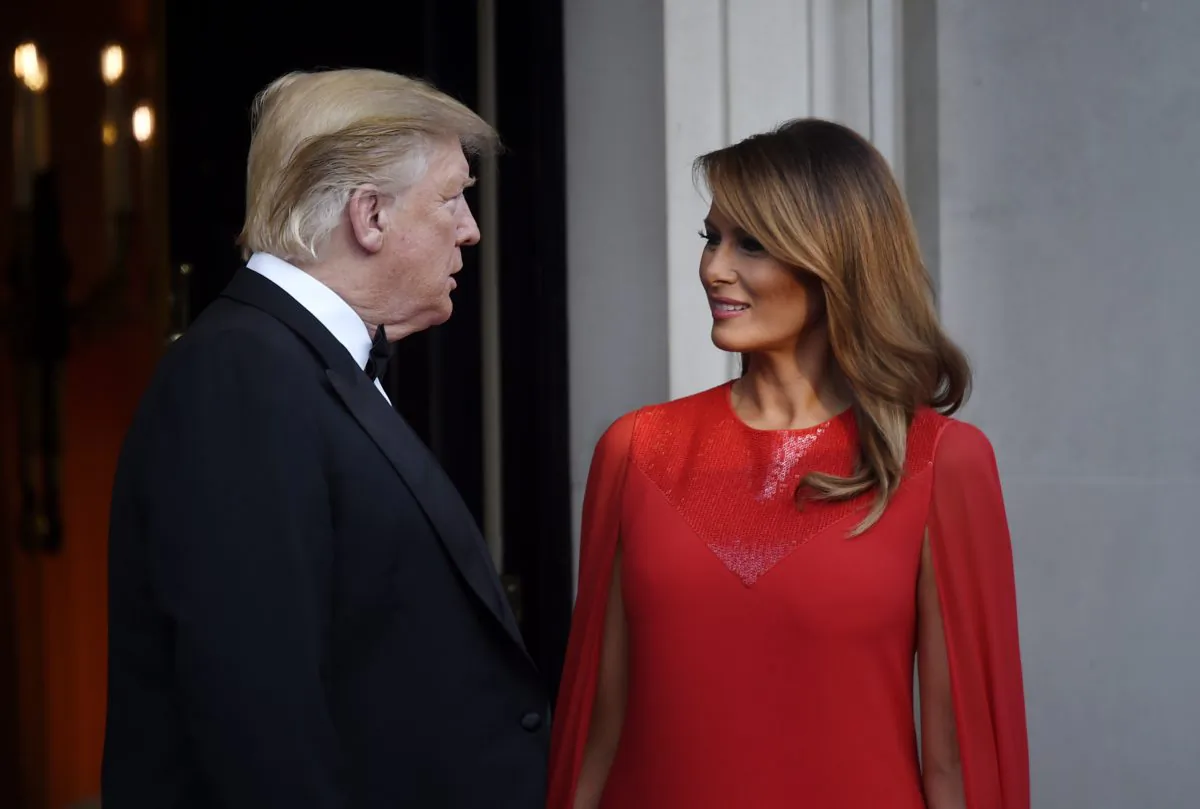 US President Donald Trump and First Lady Melania Trump pose ahead of a dinner at Winfield House for Prince Charles, Prince of Wales and Camilla, Duchess of Cornwall, during their state visit in London, England on June 4, 2019 (Peter Summers/Getty Images)