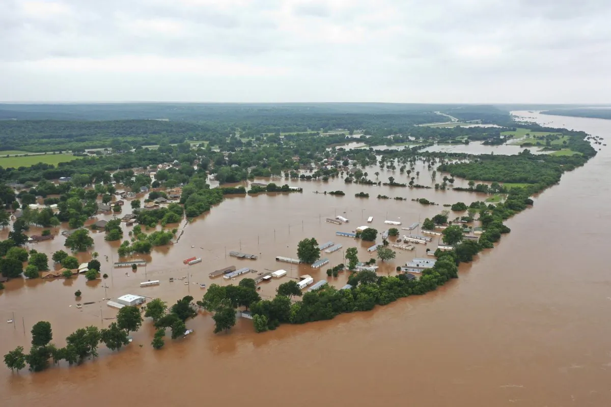 Flooded homes along Arkansas River in Sand Spring, Okla., on May 28, 2019. (DroneBase via AP)