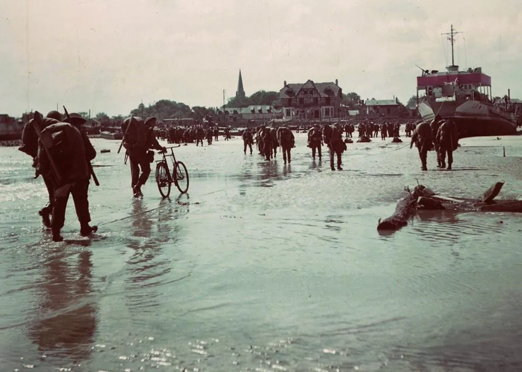 Some of the most vivid film footage of the D-Day landings 75-years ago was shot by a Canadian military film unit using technology obtained from U.S. allies. Canadian soldiers land on a Normandy, France beach during the D-Day invasion June 6, 1944. (Department of National Defence/The Canadian Press)