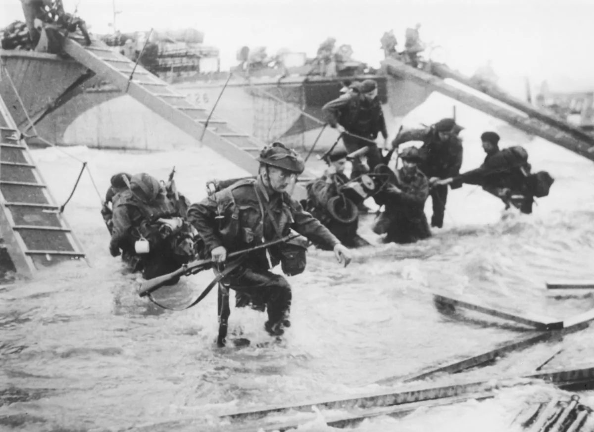 Troops from the 48th Royal Marines at Saint-Aubin-sur-mer on Juno Beach, Normandy, France, during the D-Day landings, June 6, 1944. (Hulton Archive/Getty Images)
