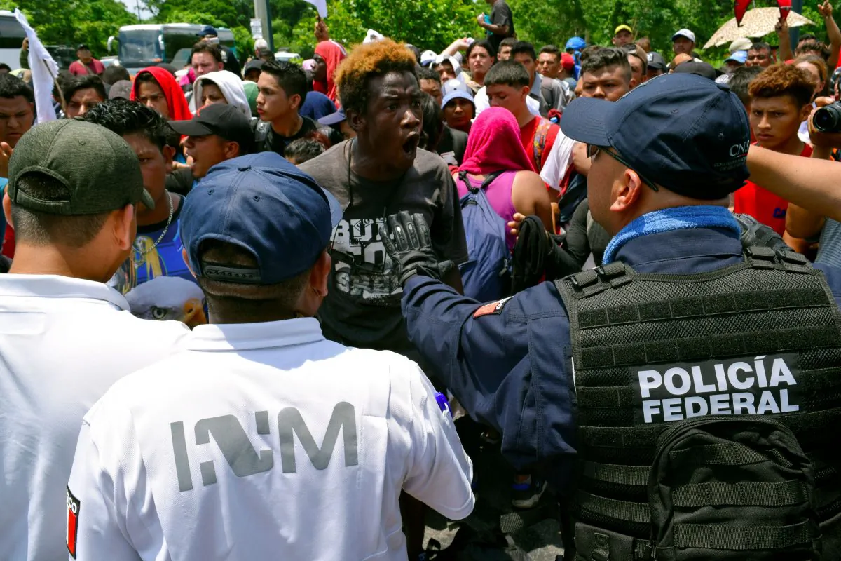 A migrant argues with a federal police officer during a joint operation by the Mexican government to stop a caravan of Central American migrants on their way to the United States, at Metapa de Dominguez, in Chiapas state, Mexico, on June 5, 2019. (Jose Torres/Reuters)