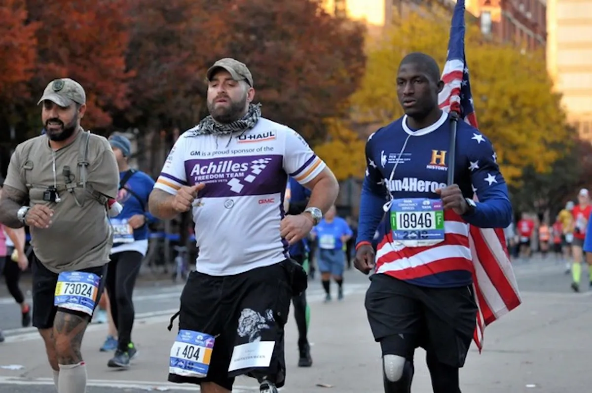 Kionte Storey (R) in the 2018 New York City Marathon. (Courtesy of Kionte Storey)