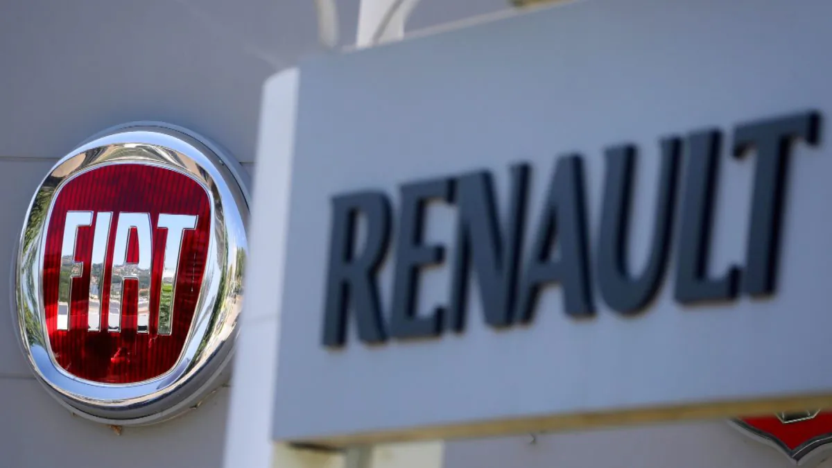 The logos of Renault and Fiat carmakers are seen in Nice, France on June 3, 2019. (Eric Gaillard/Reuters)