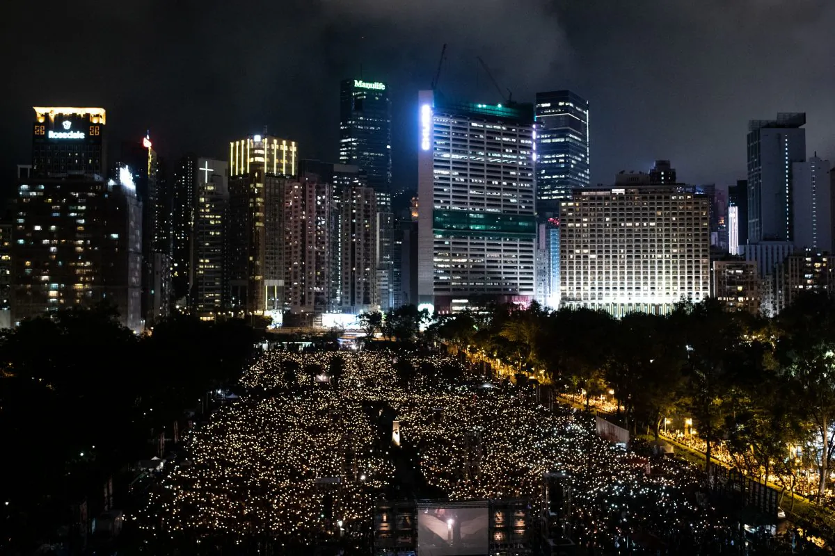 People attend a candlelight vigil at Victoria Park in Hong Kong to mark the 30th anniversary of the 1989 Tiananmen Square Massacre in Beijing on June 4, 2019. (Philip Fong/AFP/Getty Images)