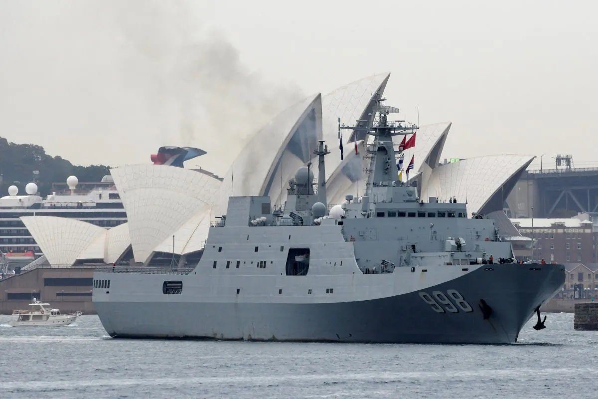 The Chinese warship Kunlun Shan passes the Sydney Opera House as it departs the Garden Island Naval Base in Sydney, Australia, on June 7, 2019.  (AAP Image/Bianca De Marchi/via Reuters)