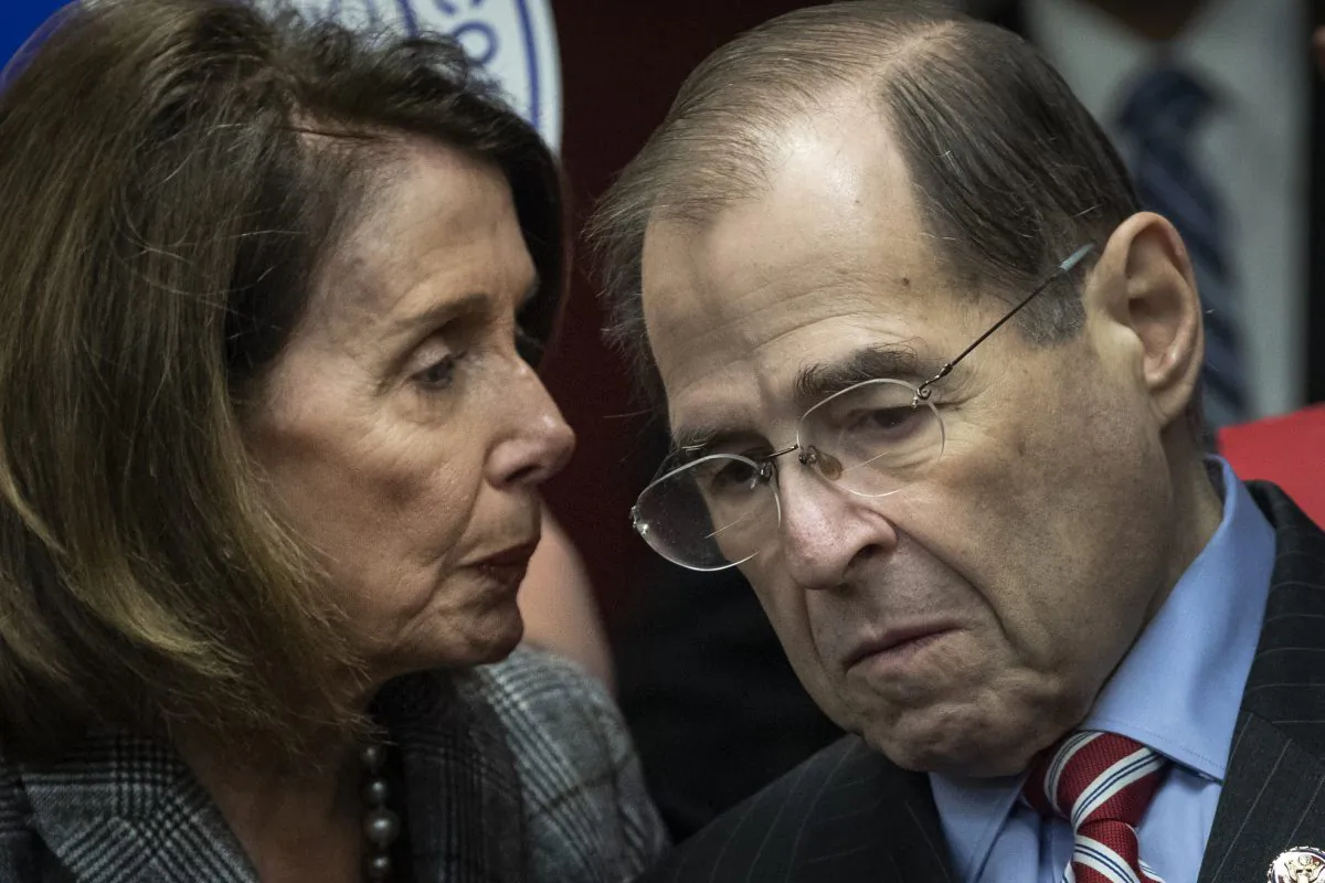 (L-R) Speaker of the House Nancy Pelosi (D-Calif.) speaks with House Judiciary Committee Chairman Rep. Jerry Nadler (D-N.Y.) during a press conference to discuss the American Dream and Promise Act at the Tenement Museum in New York City, March 20, 2019. Drew Angerer/Getty Images