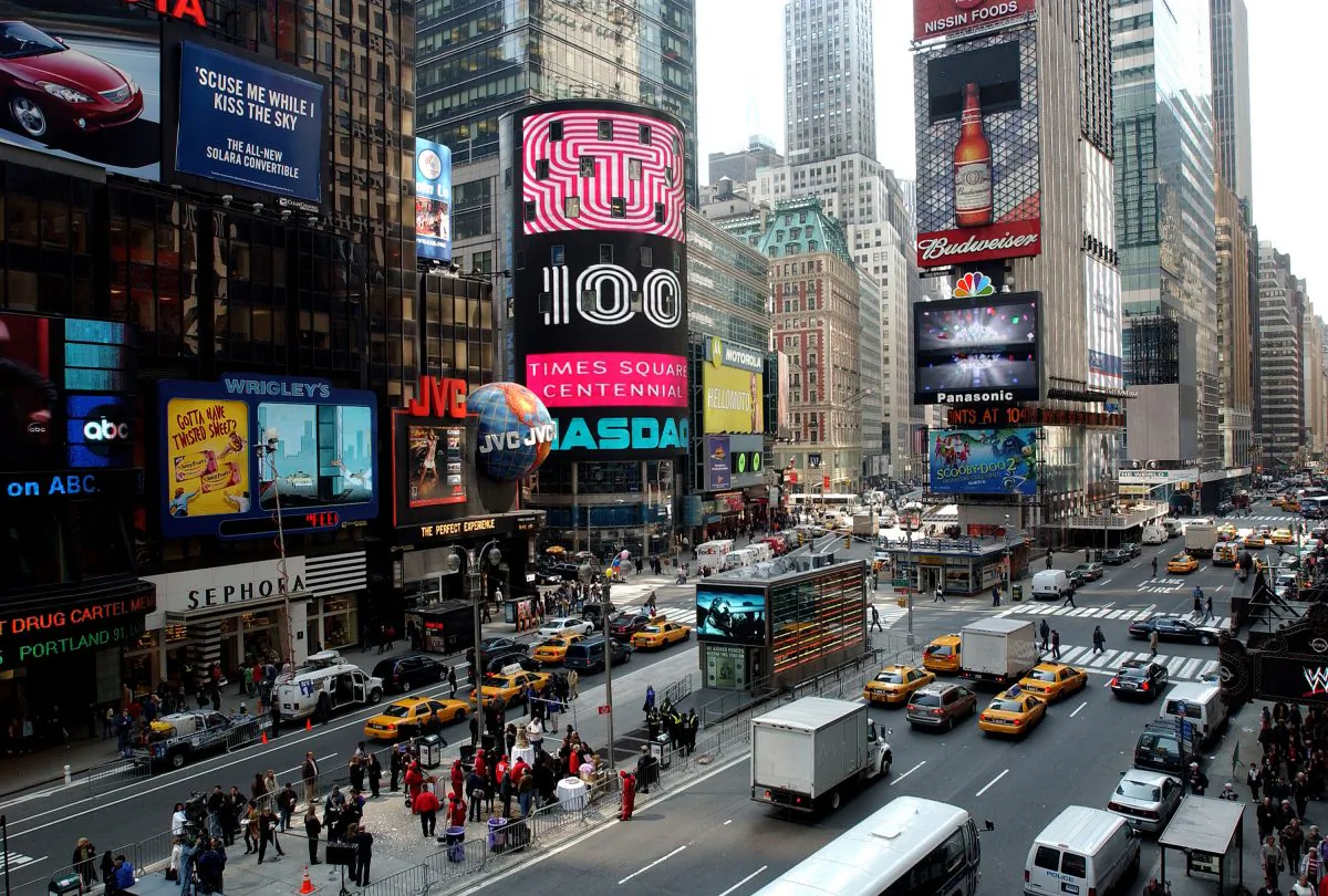 Traffic and pedestrians crowds Times Square after the celebration of the 100th anniversary of Times Square in N.Y.C., on April 7, 2004. (Stephen Chernin/Getty Images)