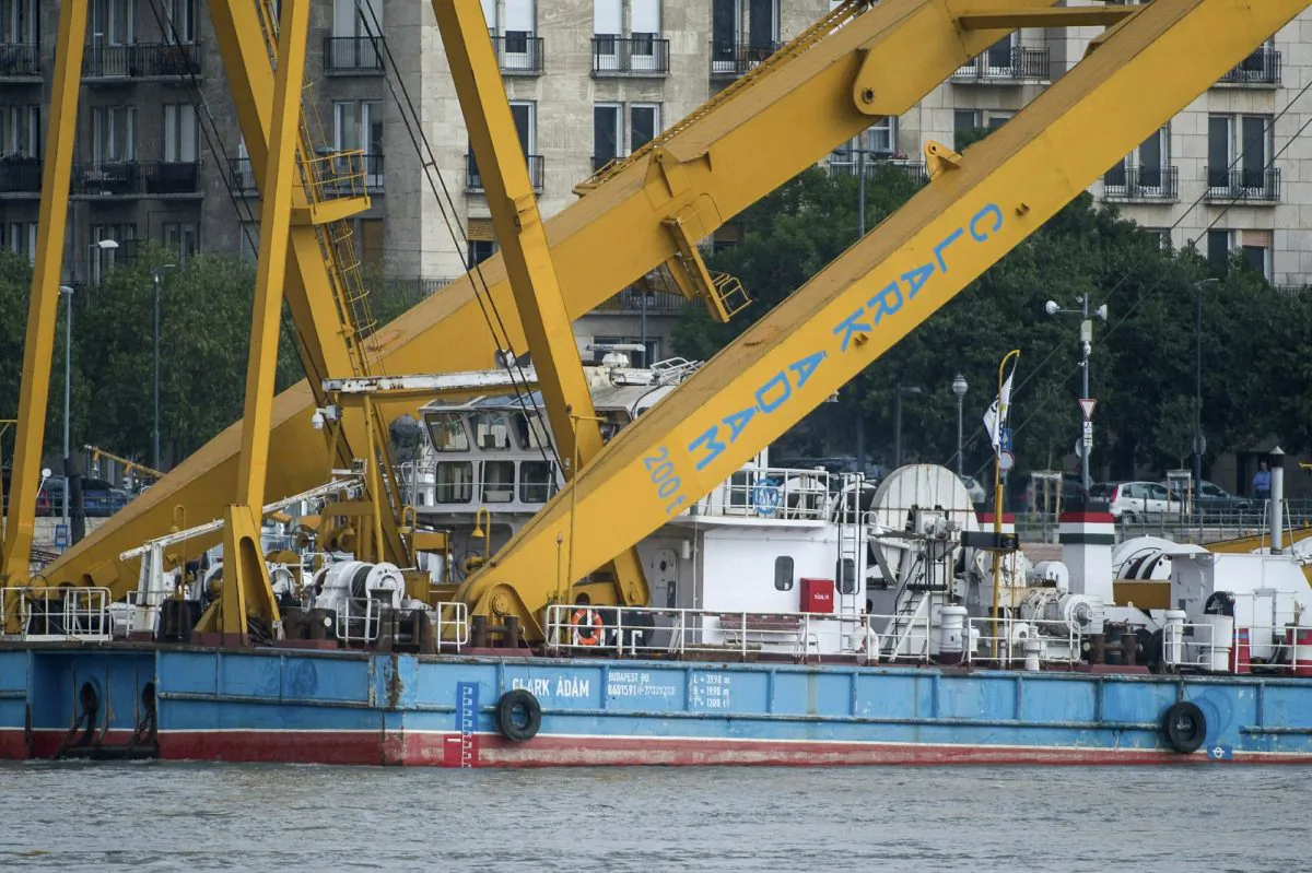 A 200-ton lift capacity crane named Clark Adam is positioned near the Margaret Bridge, the scene of the deadly boat accident in Budapest, Hungary, on June 7, 2019. (Zoltan Balogh/MTI via AP)