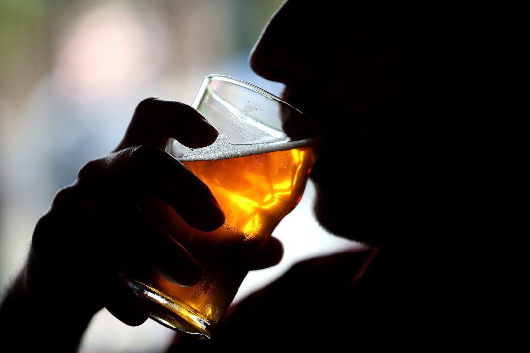A Russian River Brewing Company customer takes a sip of the newly released Pliny the Younger triple IPA beer in Santa Rosa, Calif., on Feb. 7, 2014. (Justin Sullivan/Getty Images)