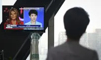 Fox Host Challenges Chinese State Media Anchor to Round 2 of Debate