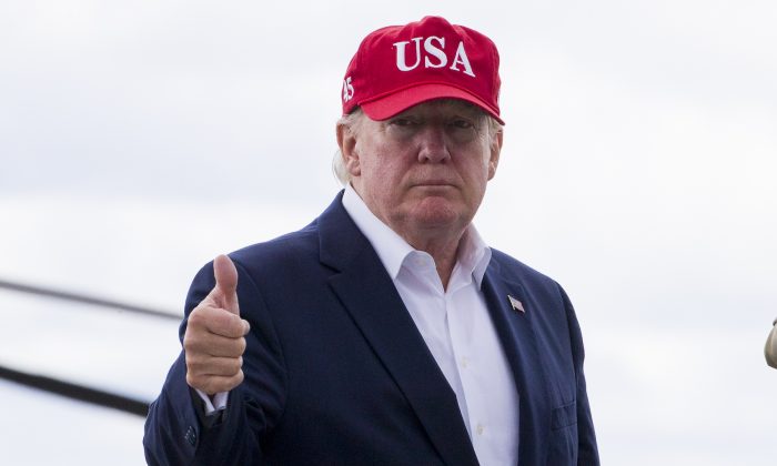 President Donald Trump gives thumbs up before departing Shannon Airport, in Shannon, Ireland, on June 7, 2019. (Alex Brandon/AP Photo)