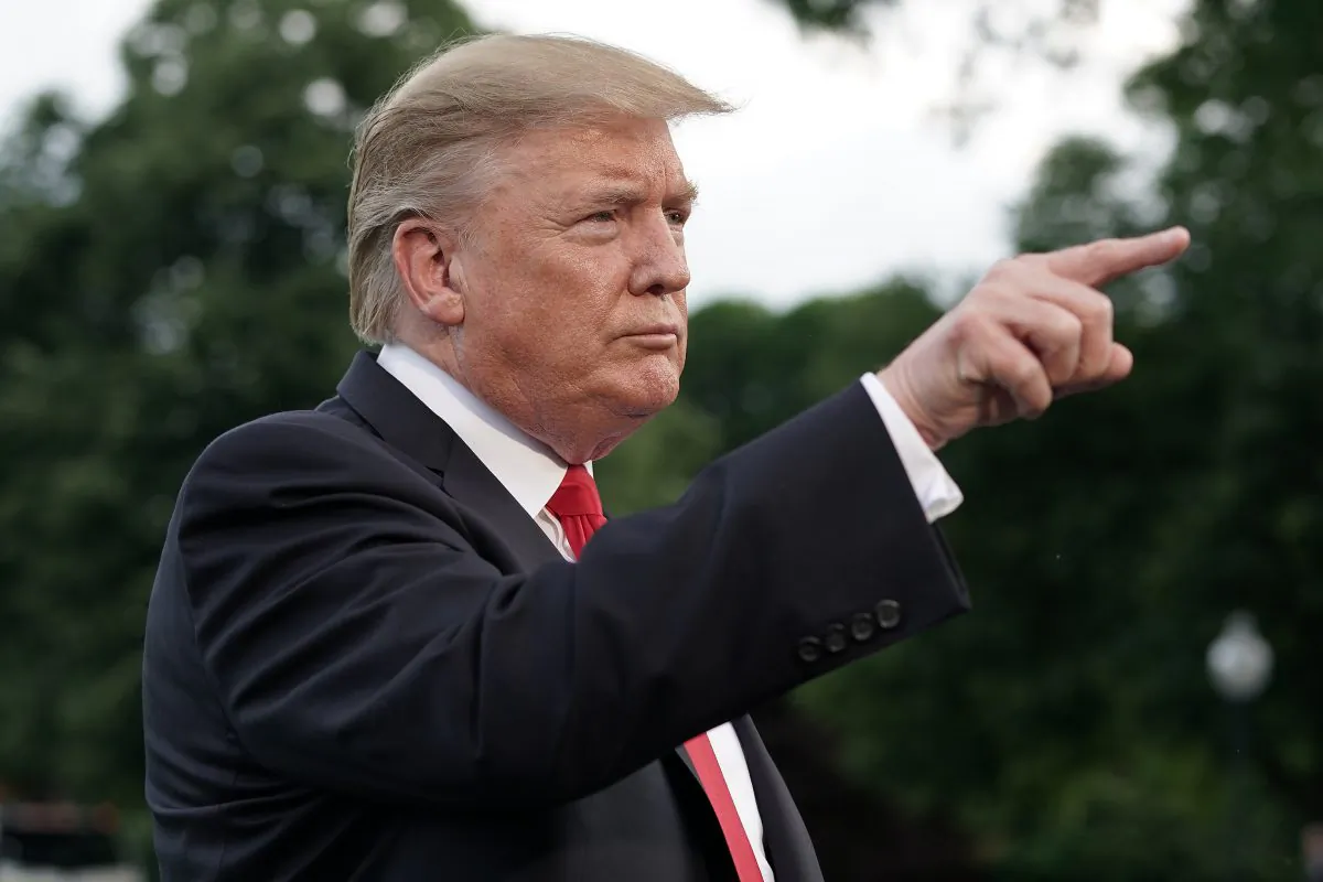 President Donald Trump talks to journalists as he departs the White House for a campaign rally in Pennsylvania May 20, 2019 in Washington. (Chip Somodevilla/Getty Images)