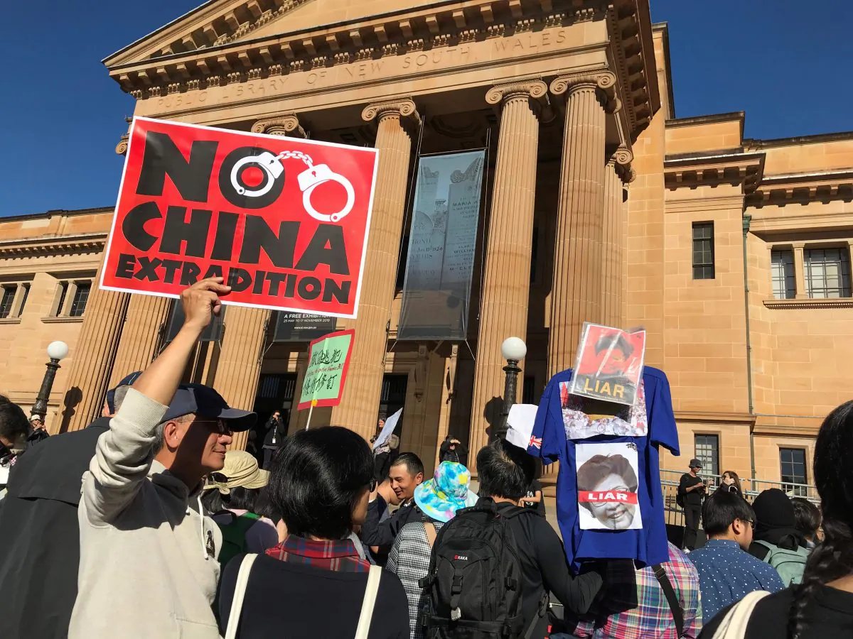 Protesters gather in front of the NSW State Library in Sydney's CBD to march against Hong Kong's proposed extradition law on June 9, 2019. (Alison Bevege/Reuters)